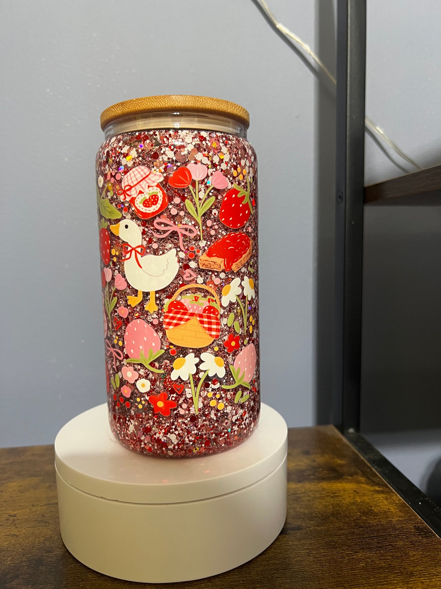 Strawberry glitter snow globe