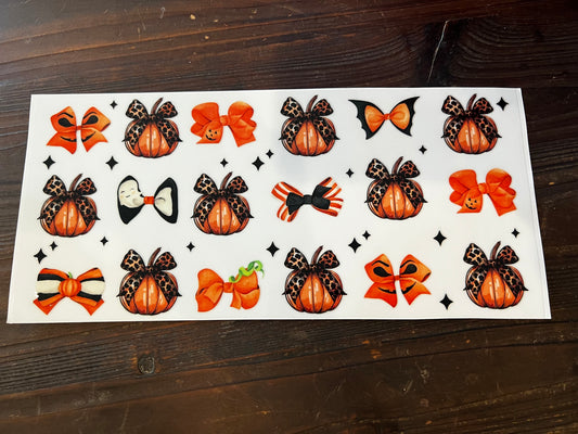 Cutesy pumpkins with bows